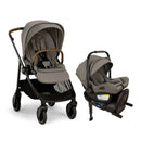 Nuna Swiv + Pipa Aire Rx Travel System in Granite, featuring a stroller and infant car seat with a sleek gray design and wooden handle.