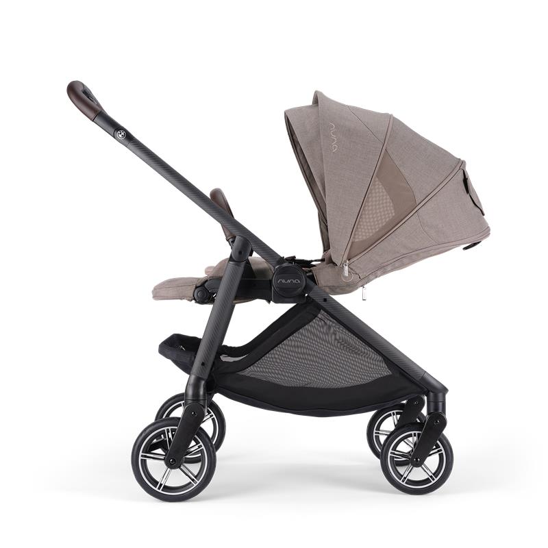 Nuna x BMW SWIV™ stroller in Umber with a sleek design, adjustable canopy, and spacious under-seat storage.