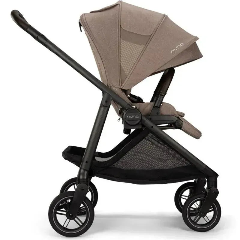 Nuna SWIV™ Stroller in Cedar color, featuring a reclining seat, adjustable canopy, and four wheels for easy maneuverability.