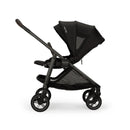 Nuna Swiv stroller in black, featuring a mesh canopy, adjustable seat, and smooth-rolling wheels.