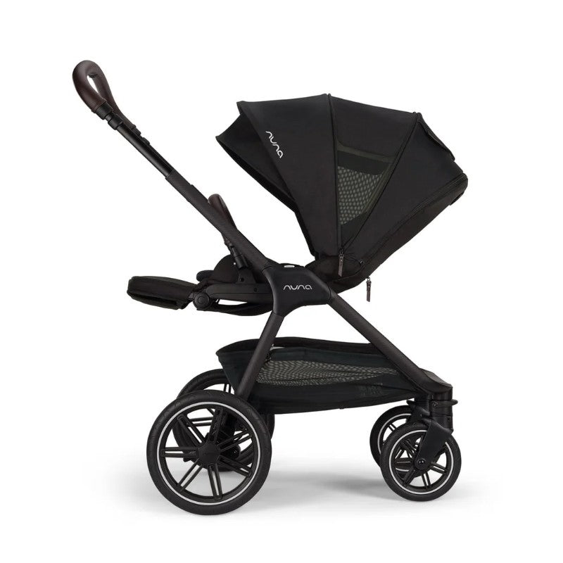 Nuna Triv LX stroller in Caviar color with a large canopy, spacious seat, and four wheels.
