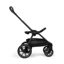 Nuna Triv Lx stroller in Caviar color, featuring a sleek design, ergonomic handle, and spacious undercarriage.