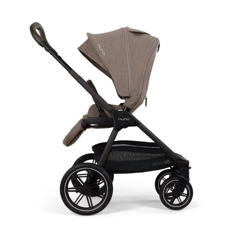 Nuna Triv Lx stroller in Cedar color, featuring a sleek design, adjustable canopy, and spacious storage basket.