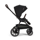 Nuna Triv Lx stroller in Caviar color, featuring a sleek design, adjustable canopy, and spacious storage basket.