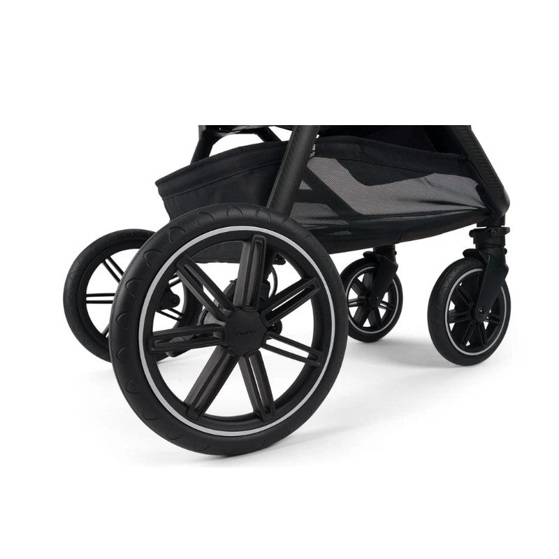 Nuna Triv Lx stroller wheels in black, featuring a sleek design with five spokes and a smooth tread.