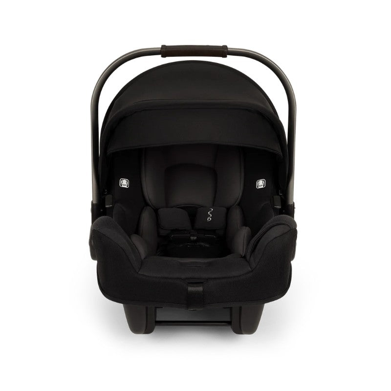 Nuna Triv Lx + Pipa Rx infant car seat in caviar color with a protective canopy and safety harness.