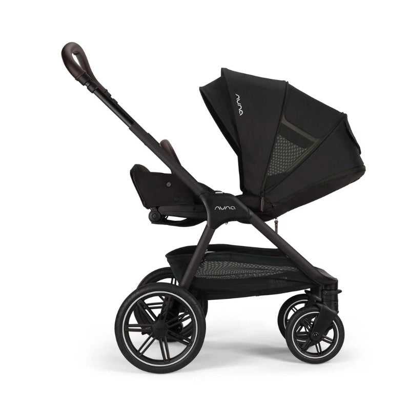 Nuna Triv Lx stroller in black, featuring a reclining seat, adjustable canopy, and spacious storage basket.