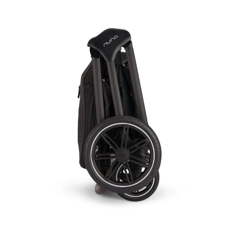 Nuna Triv Lx stroller folded with wheels visible, designed for portability and convenience in a Caviar color.