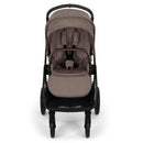 Nuna Triv Lx stroller in Cedar color. Features a compact design, harness system, and spacious bottom storage.