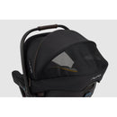 Nuna Triv Lx + Pipa Urbn Travel System in Caviar color, featuring a black canopy with mesh panel and brown handle.