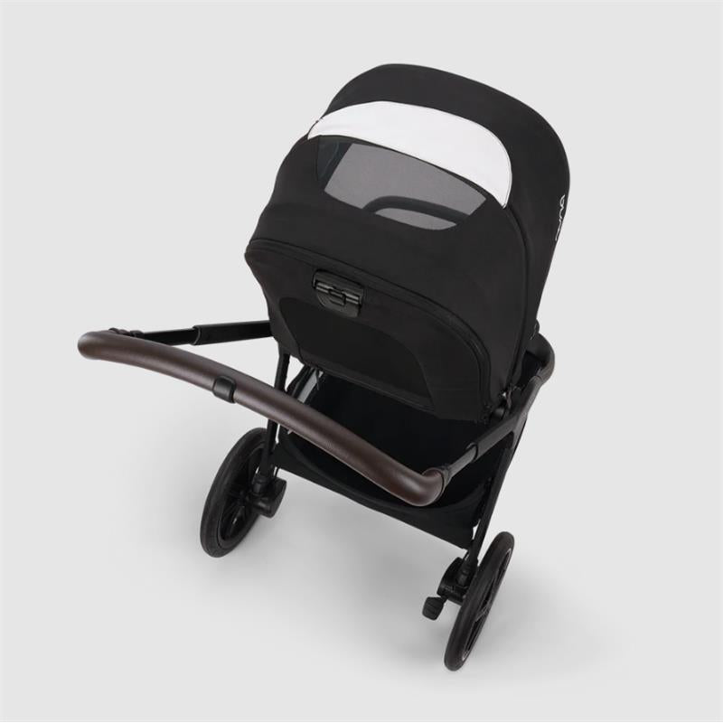 Nuna Triv Lx stroller in black with a white canopy, featuring a brown handlebar and a spacious storage basket.