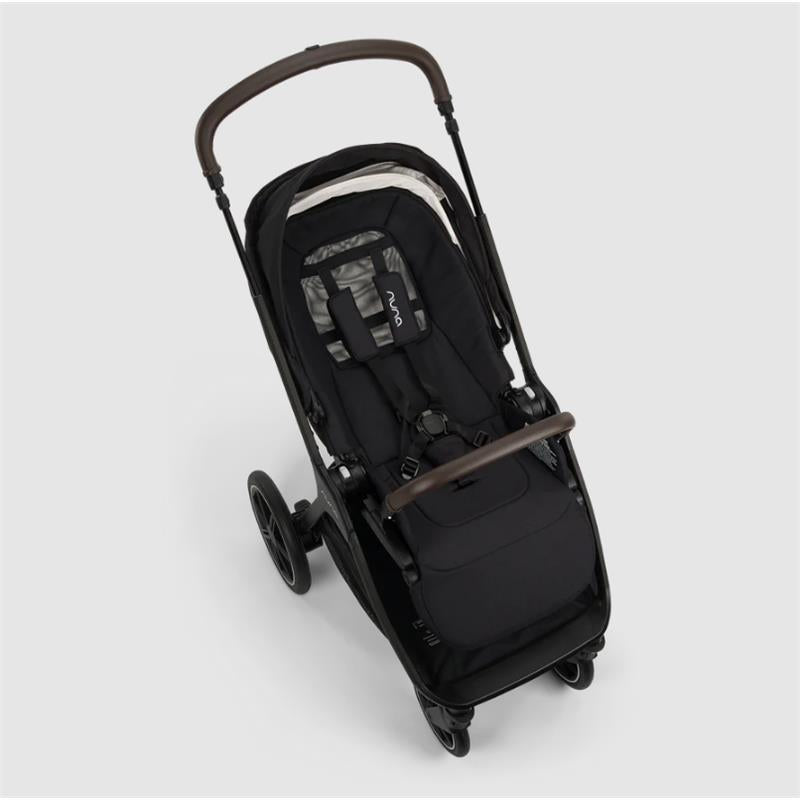 Nuna Triv Lx stroller with a black fabric seat and brown handlebar, designed for infants and toddlers.