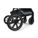 Nuna Triv Lx stroller with sleek black wheels, showcasing a modern design and sturdy construction.