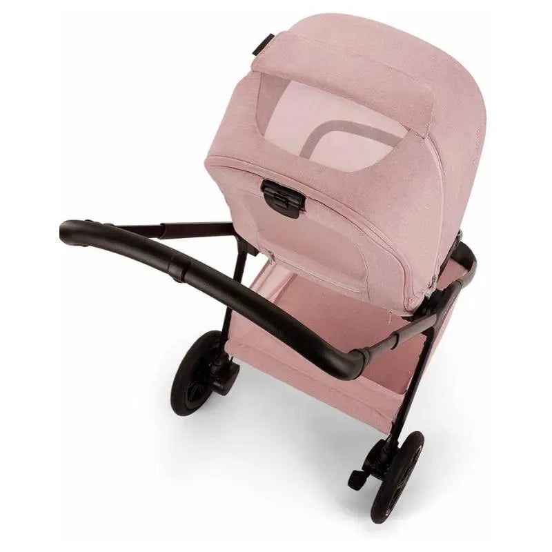 Nuna TRIV™ next stroller in Thistle color, featuring a magnetic buckle and a spacious storage basket underneath.