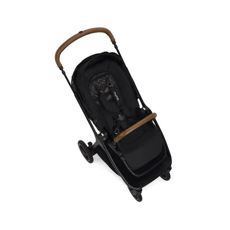 Nuna TRIV™ next stroller in Caviar/Cognac with a black seat, magnetic buckle, and a brown handle, positioned upright.