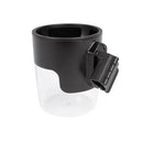 Nuna TRVL™ Cup Holder in black, featuring a clear cup section and an attachable clip for securing to strollers.