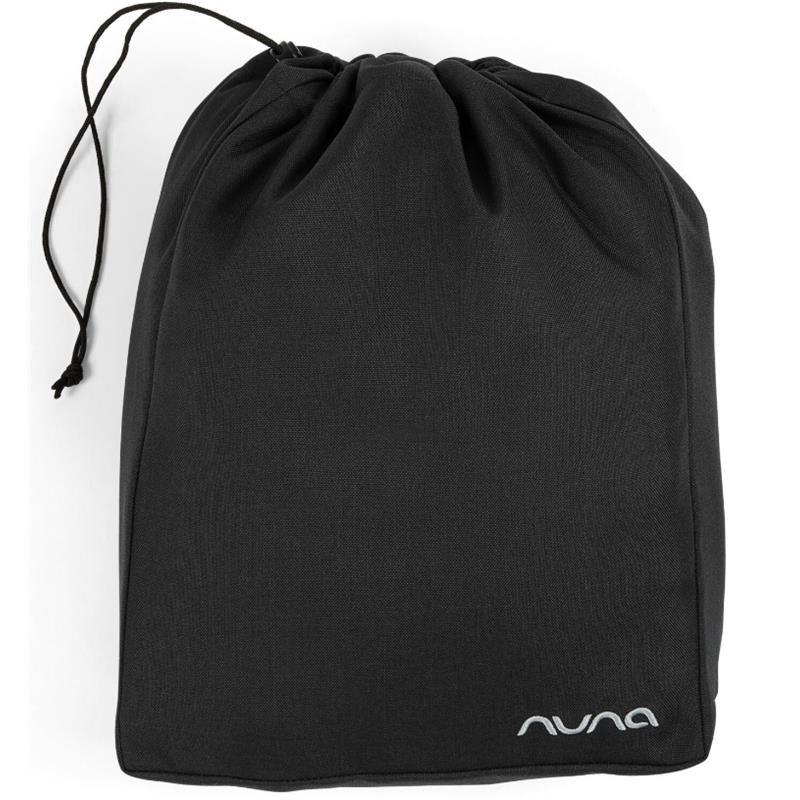 Nuna TRVL™ dubl Footmuff in Caviar color, shown in a drawstring storage bag with the Nuna logo.