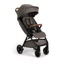Nuna TRVL™ lx stroller in granite, featuring a compact design, adjustable canopy, and leatherette handle.