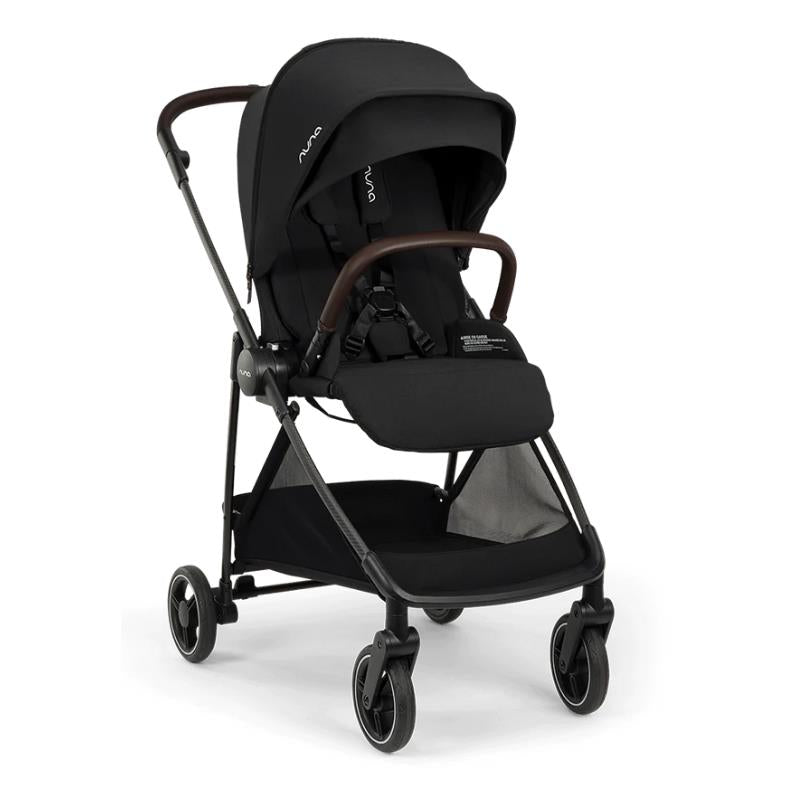 Nuna PIPA™ urbn Flex System Seat in Caviar color, displaying a sleek design with a black fabric seat and brown handle.
