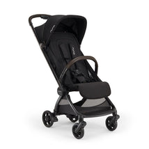 Ultra-compact Nuna VIAA™ cabn stroller in caviar color, featuring a black seat, adjustable canopy, and a cushioned footrest.