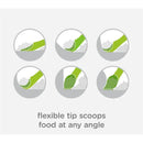 Flexible baby feeding spoons in green, demonstrating the ability to scoop food at various angles.