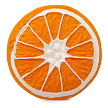 Chewable toy shaped like a sliced orange, featuring vibrant orange color and white detailing to mimic texture.