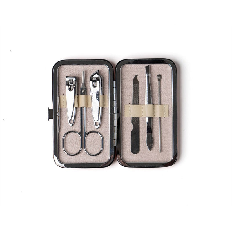 Olivia Moss Mani Pedi Ready Manicure Kit in a compact case, featuring nail clippers, scissors, a file, and a cuticle pusher.
