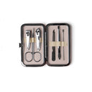 Olivia Moss Mani Pedi Ready Manicure Kit in a compact case, featuring nail clippers, scissors, a file, and a cuticle pusher.