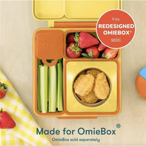 Two colorful leakproof dip containers, orange and purple, with celery, strawberries, and chicken nuggets inside.