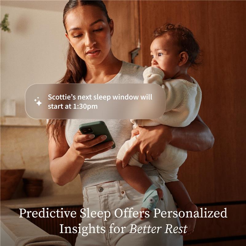 Mother holding a baby in a white outfit while checking a smartphone, with a message about sleep insights.