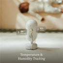 Smart HD video baby monitor displaying 68°F room temperature and 52% humidity readings, with a softly blurred baby in the background.
