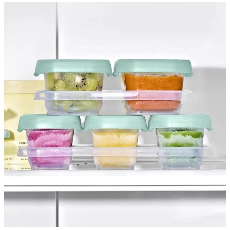 Oxo Tot 12-piece baby food storage container set in opal, featuring colorful fruit purees in stackable containers with green lids.