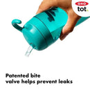 Oxo Tot Adventure Water Bottle in Dusk color, featuring a patented bite valve to prevent leaks, held in hand.