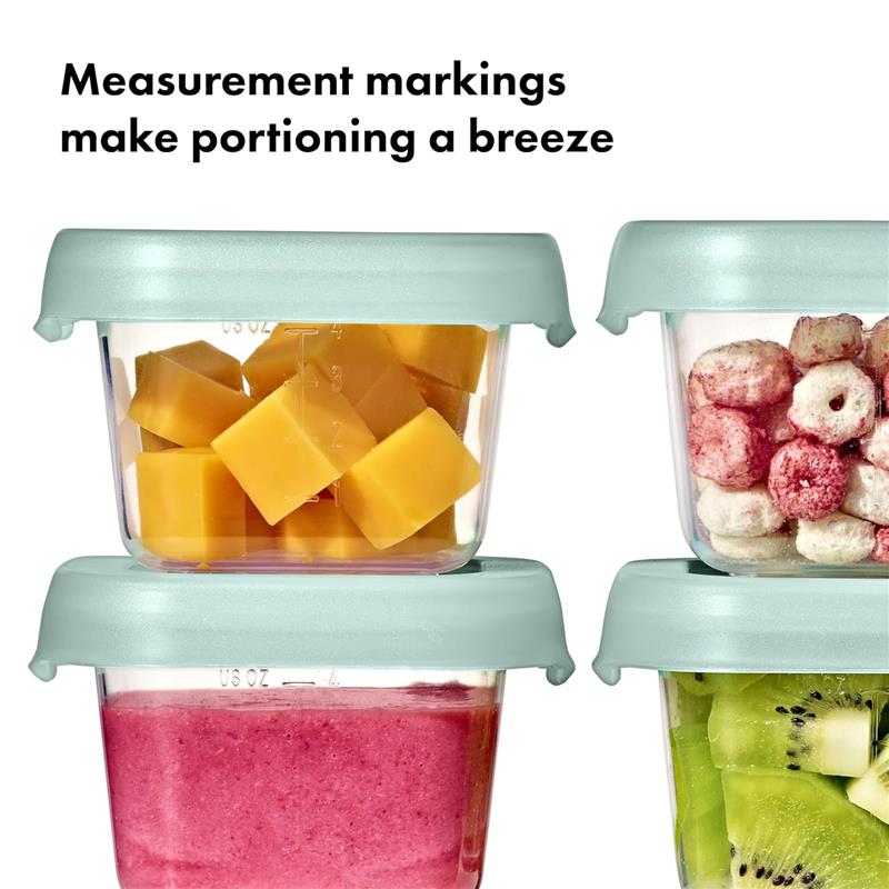 Oxo - Tot Baby Blocks Food Storage Container set featuring four 4 oz containers with colorful food, showcasing measurement markings.