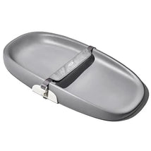 OXO Tot Changing Pad in gray with a soft surface and a safety strap for secure changing.