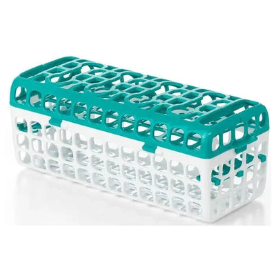 Oxo Tot dishwasher basket for cleaning bottle parts, featuring a teal and white design with open-grid structure.
