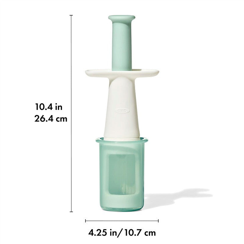 OXO Tot Grape Cutter in opal color, measuring 10.4 inches, designed for safely cutting grapes into quarters.