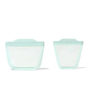 Oxo Tot Silicone Reusable Bags in opal color, featuring one larger and one smaller bag for snacks and cups.