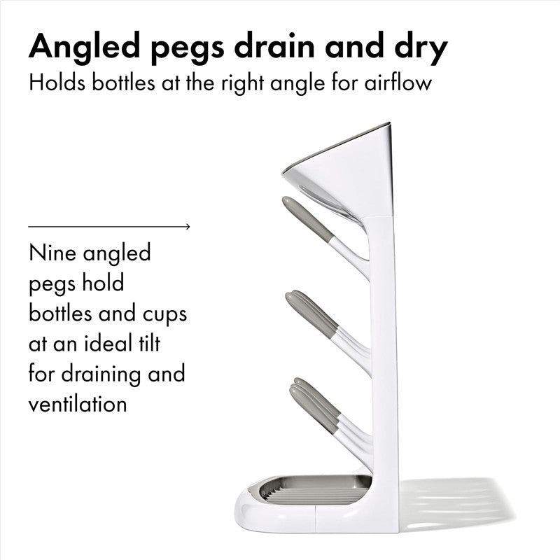Gray OXO Tot Space Saving Drying Rack with nine angled pegs for optimal bottle and cup drying and ventilation.