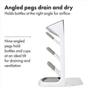 Gray OXO Tot Space Saving Drying Rack with nine angled pegs for optimal bottle and cup drying and ventilation.