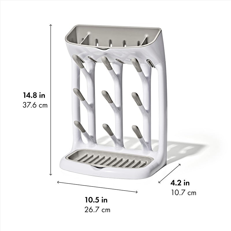 Gray OXO Tot Space Saving Drying Rack with multiple drying branches and a slotted bottom for drainage, dimensions displayed.