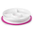 Oxo Tot Stick & Stay Divided Plate in pink, featuring three sections plus a central cup holder for easy mealtime organization.