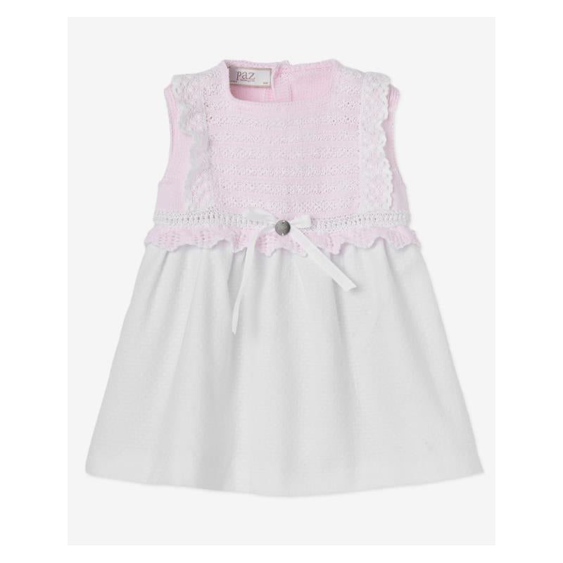 Baby girl dress set featuring a pink knitted top and white skirt, adorned with lace and ribbon details.