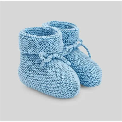 Knit baby booties in ocean blue with a folded cuff and tie detail, designed for infant comfort and style.