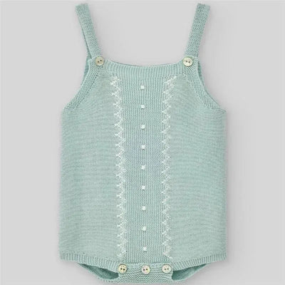 Knit newborn body in cream and beige with buttons, patterned center, and spaghetti straps for baby wear.