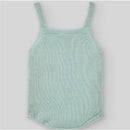 Baby knit bodysuit in cream and beige colors with thin straps, designed for newborns. Soft, textured knit fabric.