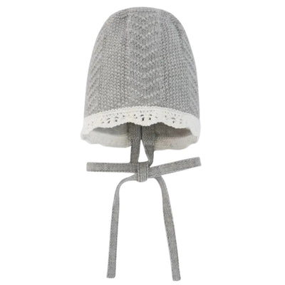 Knit newborn bonnet in grey pearl with a chevron pattern and lace trim, featuring ties for secure fit.