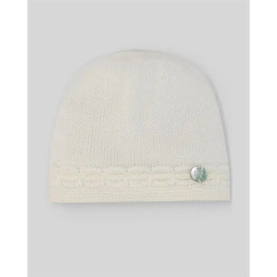 Knit newborn hat in cream and beige, featuring a decorative button on the side and a textured band at the bottom.