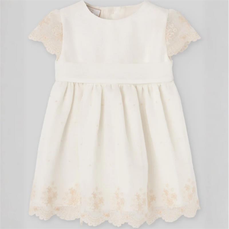 Cream sleeveless baby dress with lace cap sleeves and embroidered floral details along the hem.