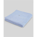 Knit newborn blanket in light pink and cream, featuring a soft texture and decorative stitching details.